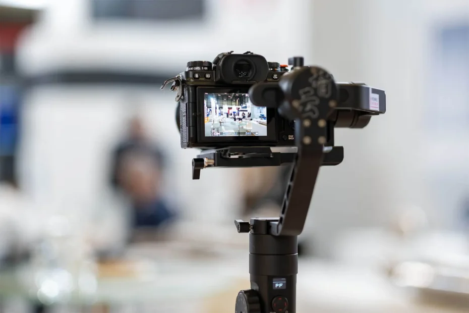 Photographer documenting exhibitor activity at an Istanbul trade fair
