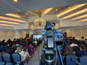 Camera crew capturing live stream video during a product launch in Istanbul