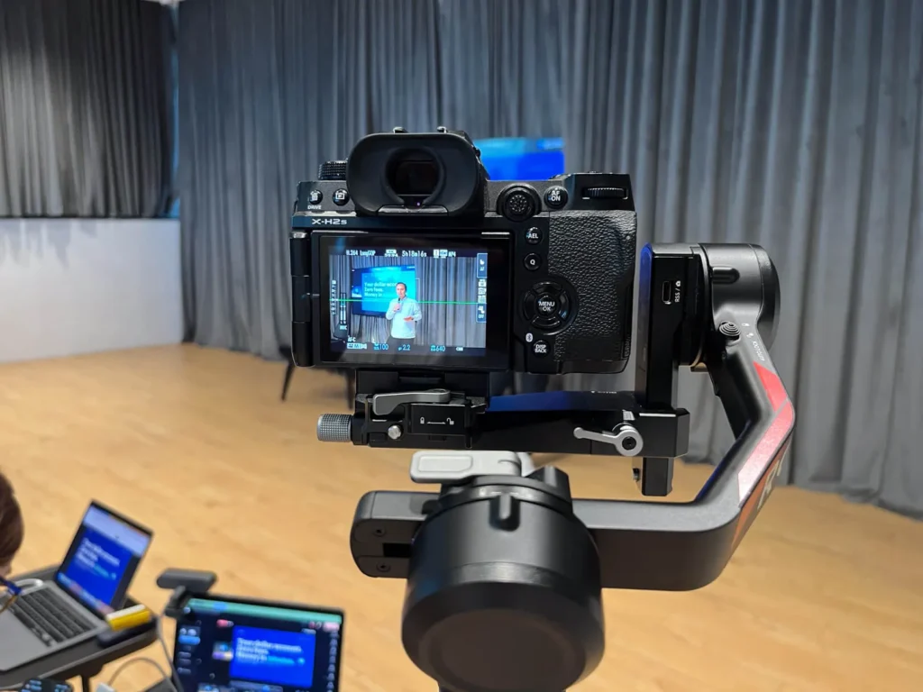 Camera setup filming a session at a real estate and construction summit in Istanbul
