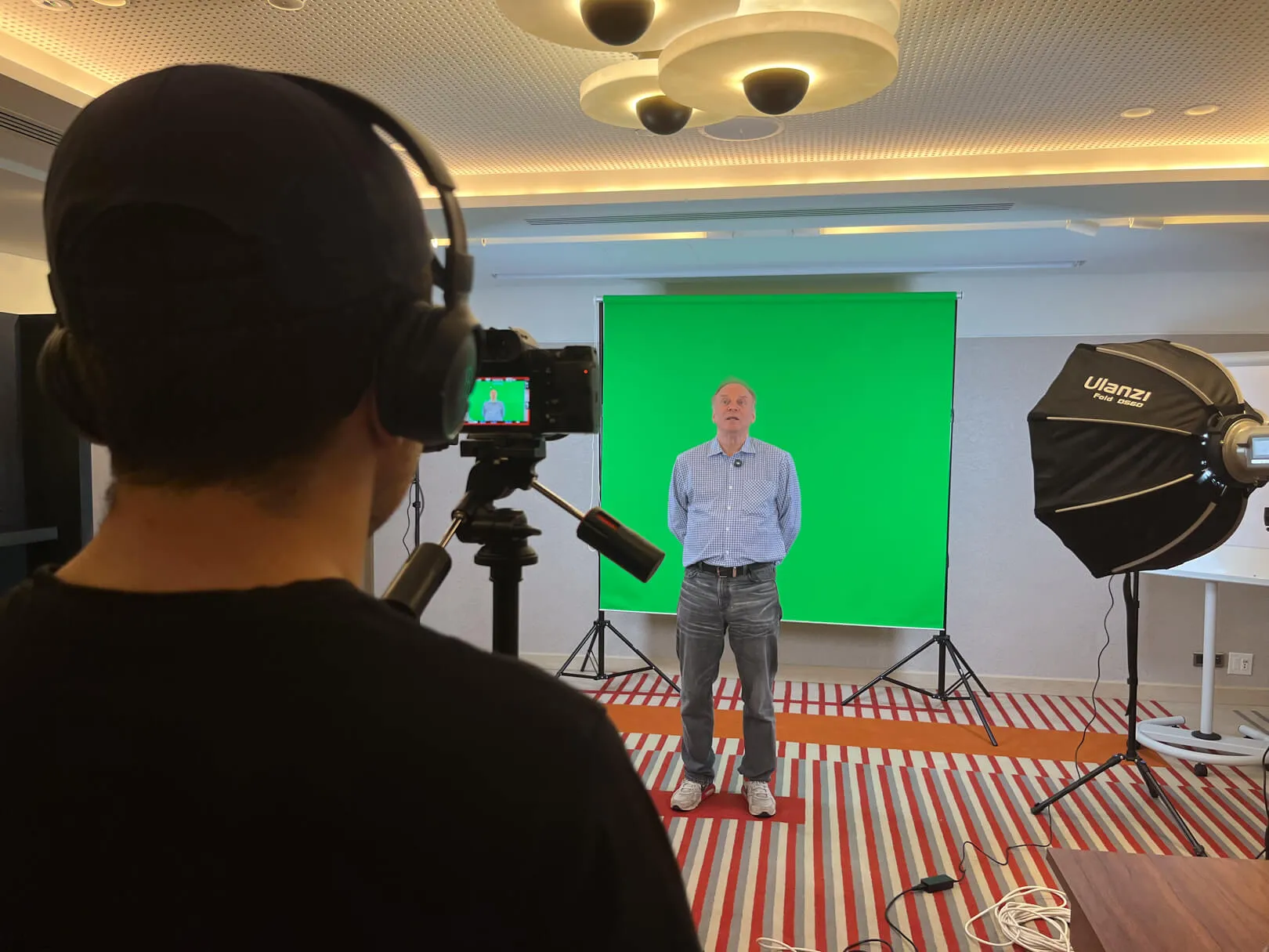 Green screen founder interview setup for a Web3 event