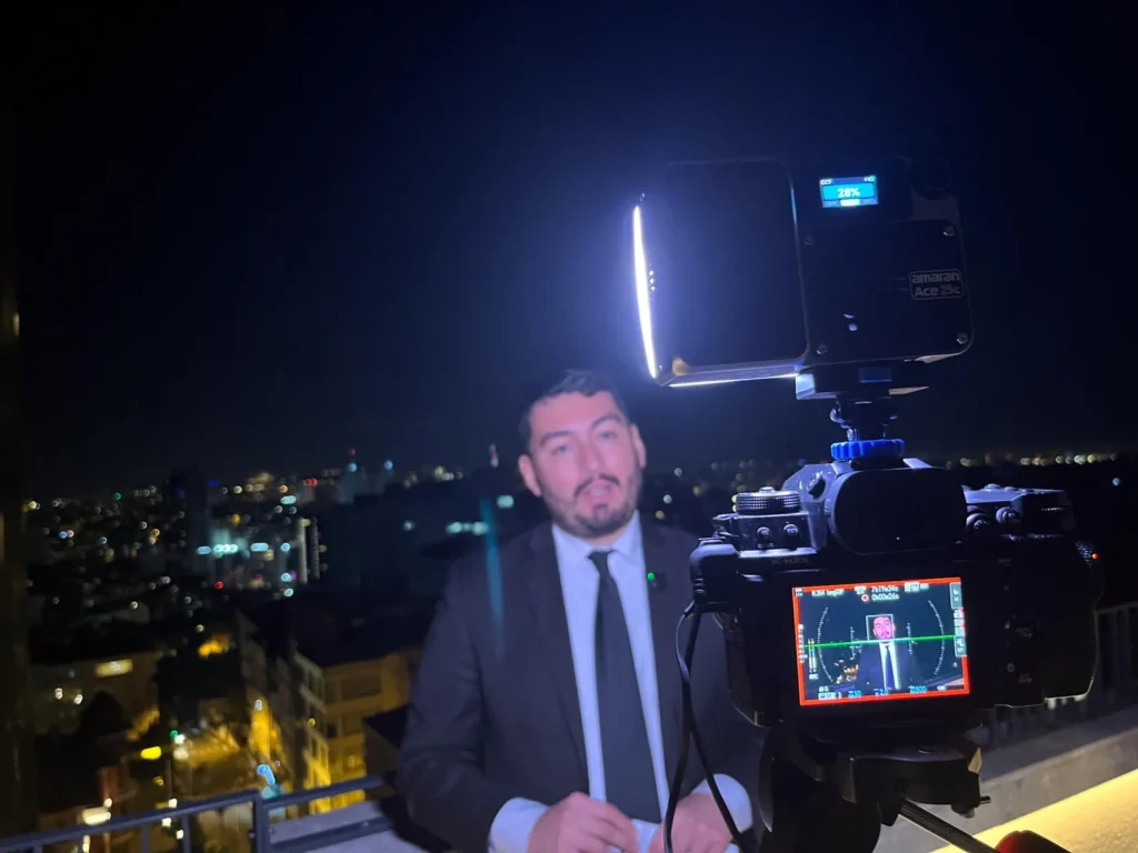 Reporter conducting an interview at a media launch event in Istanbul